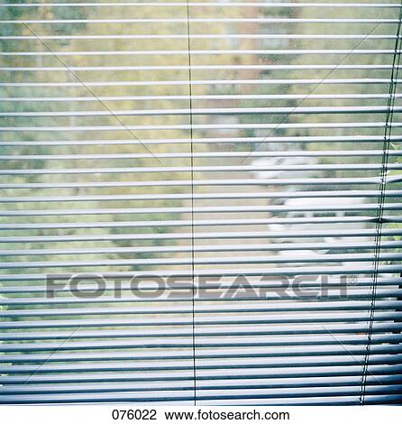 A parking lot through a set of blinds View Large Photo Image Stock Image - A parking lot through a set of blinds. Fotosearch