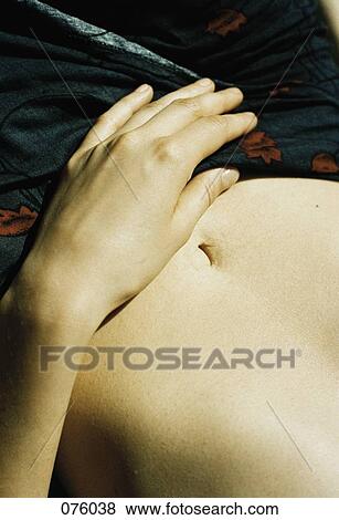 A person's stomach View Large Photo Image Stock Photo - A person's stomach. Fotosearch