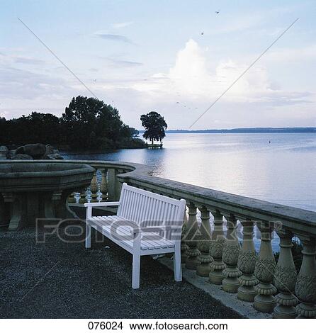 Picture - A white bench on a terrace. Fotosearch