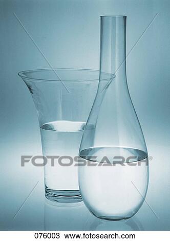Two vases filled with water View Large Photo Image Stock Image - Two vases filled with water. Fotosearch