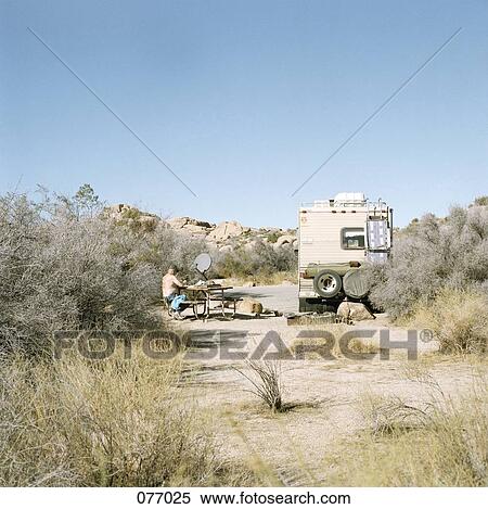 Camper at rest stop with mobile home, Joshua Tree National Park, USA View Large Photo Image Stock Photography - Camper at rest stop with mobile home, Joshua Tree National Park, USA . Fotosearch