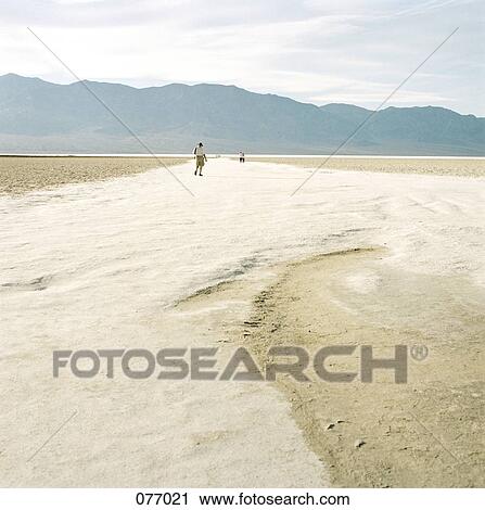 Hiking through valley, Death Valley, USA View Large Photo Image Stock Image - Hiking through valley, Death Valley, USA. Fotosearch