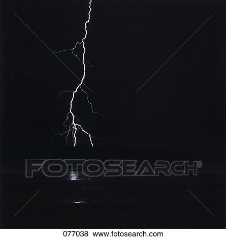 Lightning over water at night, New Mexico, USA View Large Photo Image Stock Photo - Lightning over water at night, New Mexico, USA. Fotosearch