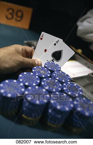 A man holding two aces in his hand, Las Vegas, Nevada, USA View Large Photo Image Stock Photo - A man holding two aces in his hand, Las Vegas, Nevada, USA. Fotosearch