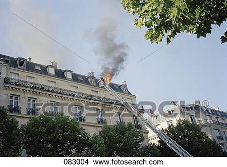 Picture - A fire on a rooftop, Paris, France. Fotosearch