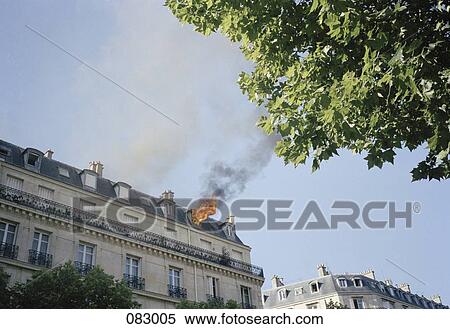 A fire on a rooftop, Paris, France View Large Photo Image Stock Photography - A fire on a rooftop, Paris, France. Fotosearch