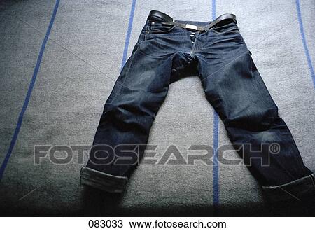 A pair of jeans, front view View Large Photo Image Stock Image - A pair of jeans, front view. Fotosearch
