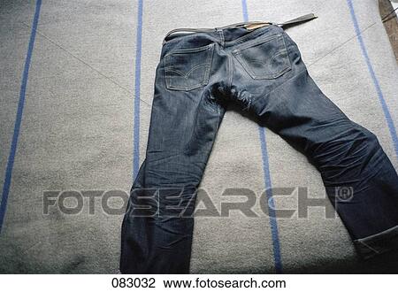 Stock Image - A pair of jeans, rear view. Fotosearch
