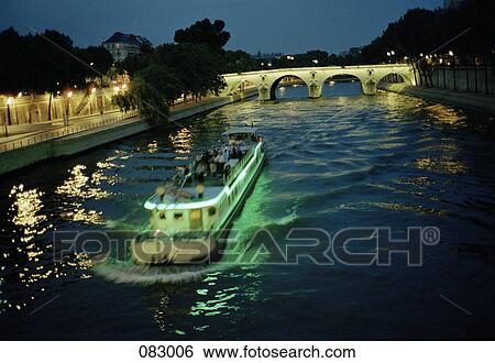 Ferry on the Seine river, Paris, France View Large Photo Image Stock Photograph - Ferry on the Seine river, Paris, France. Fotosearch