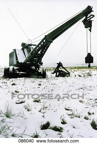 Abandoned machinery in snow View Large Photo Image Stock Image - Abandoned machinery in snow. Fotosearch