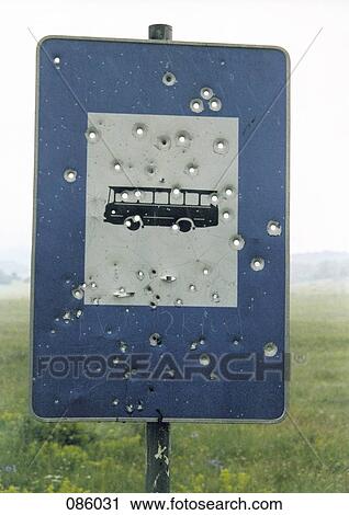 Bullet holes in bus sign View Large Photo Image Stock Image - Bullet holes in bus sign . Fotosearch
