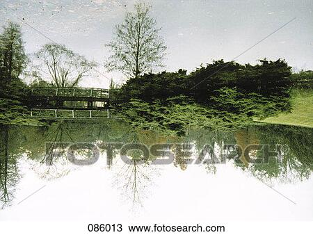 Rural landscape with covered bridge View Large Photo Image Stock Image - Rural landscape with covered bridge. Fotosearch
