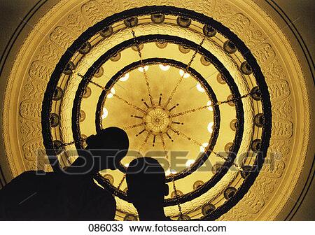 Silhouettes with chandelier View Large Photo Image Stock Image - Silhouettes with chandelier. Fotosearch