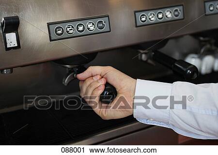 Close-up of barista using an espresso machine View Large Photo Image Stock Image - Close-up of barista using an espresso machine. Fotosearch
