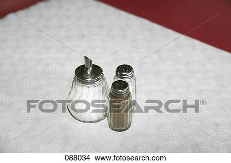 Sugar shaker, salt shaker and pepper shaker View Large Photo Image Picture - Sugar shaker, salt shaker and pepper shaker. Fotosearch