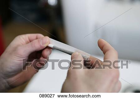 Man rolling cigarette View Large Photo Image Stock Photo - Man rolling cigarette. Fotosearch