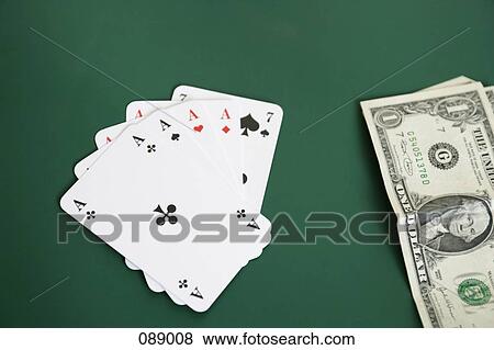 Playing cards and dollar bills View Large Photo Image Stock Photo - Playing cards and dollar bills. Fotosearch