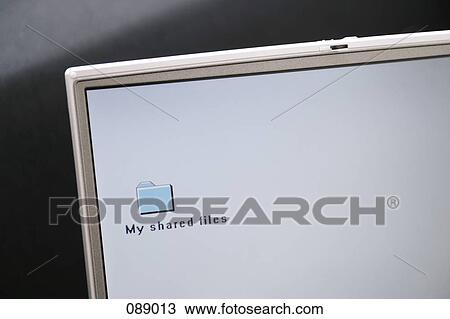 Shared file folder on a computer desktop View Large Photo Image Stock Image - Shared file folder on a computer desktop. Fotosearch