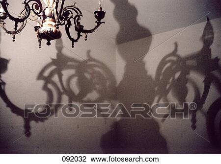 Chandelier and its shadow View Large Photo Image Stock Image - Chandelier and its shadow . Fotosearch