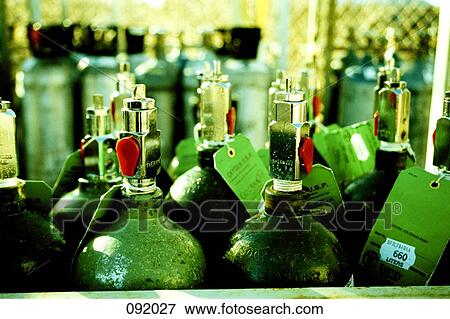 Uncapped oxygen containers View Large Photo Image Stock Photo - Uncapped oxygen containers. Fotosearch