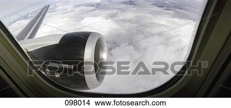 Airplane wing through window View Large Photo Image Picture - Airplane wing through window. Fotosearch