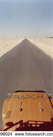 Off-road vehicle on desert road, Sahara desert, Egypt View Large Photo Image Picture - Off-road vehicle on desert road, Sahara desert, Egypt. Fotosearch