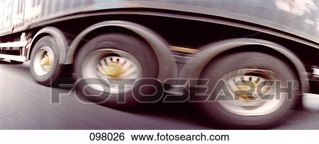 Semi-truck wheels, close-up View Large Photo Image Stock Photograph - Semi-truck wheels, close-up. Fotosearch