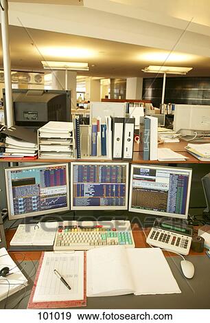 Desk in day trading office View Large Photo Image Stock Photo - Desk in day trading office. Fotosearch