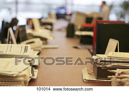 Picture - Documents stacked in piles. Fotosearch