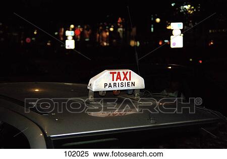Close-up of taxi, Paris, France View Large Photo Image Stock Photography - Close-up of taxi, Paris, France. Fotosearch