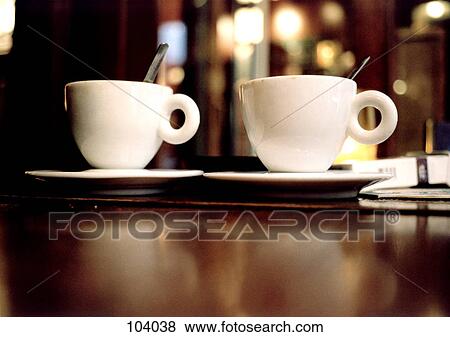 Two coffee cups View Large Photo Image Stock Photo - Two coffee cups. Fotosearch