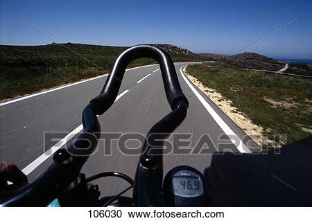 Motorcycle close-up on rural road View Large Photo Image Stock Image - Motorcycle close-up on rural road. Fotosearch