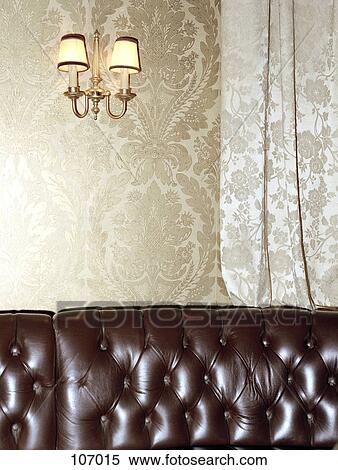 Stock Photography - Brown leather couch in living room. Fotosearch