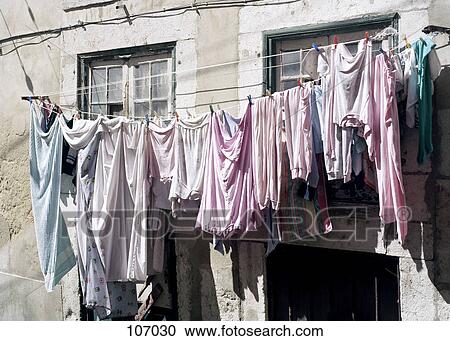 Laundry hanging on clothesline View Large Photo Image Stock Image - Laundry hanging on clothesline. Fotosearch
