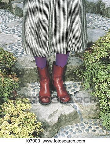 Person wearing red boots View Large Photo Image Stock Image - Person wearing red boots. Fotosearch