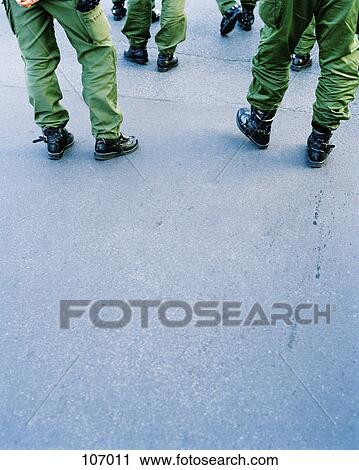 Stock Image - Police officers’ legs, Germany. Fotosearch