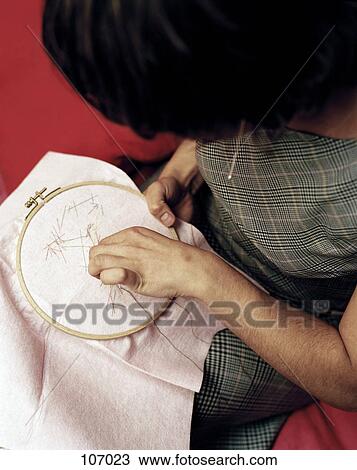 Woman doing needlepoint View Large Photo Image Stock Image - Woman doing needlepoint. Fotosearch