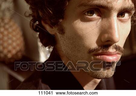 Portrait of man looking at camera View Large Photo Image Stock Image - Portrait of man looking at camera. Fotosearch
