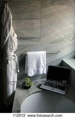 Laptop computer on bathtub ledge View Large Photo Image Stock Image - Laptop computer on bathtub ledge. Fotosearch