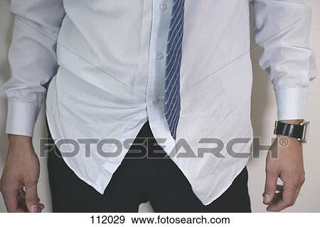 Man wearing wrinkled shirt and tie View Large Photo Image Stock Photo - Man wearing wrinkled shirt and tie. Fotosearch