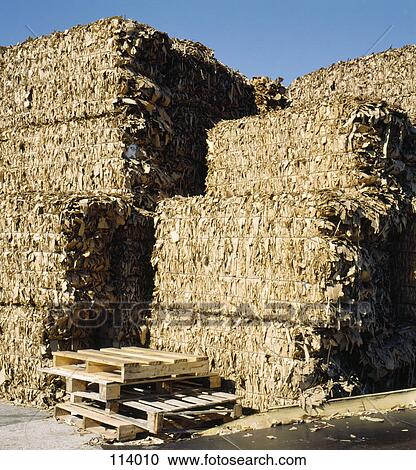 Stock Image - Bundled cardboard for recycling. Fotosearch
