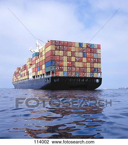 Stock Image - Cargo ship transporting containers. Fotosearch