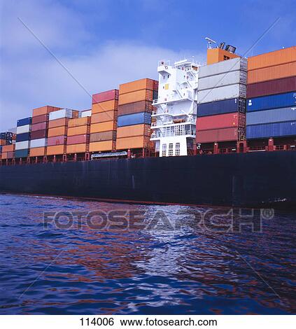 Freight containers stacked on dock View Large Photo Image Stock Photograph - Freight containers stacked on dock. Fotosearch