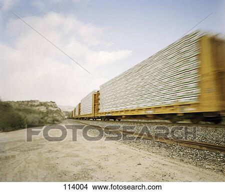 Freight train in motion View Large Photo Image Picture - Freight train in motion. Fotosearch