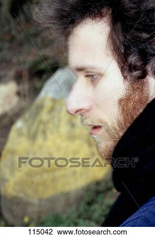 Stock Image - Close-up of man with beard. Fotosearch
