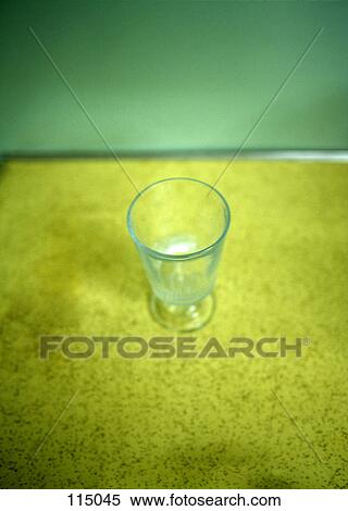 Empty glass on counter top View Large Photo Image Stock Photography - Empty glass on counter top. Fotosearch