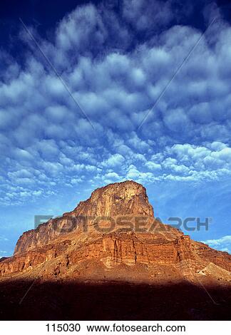 Stock Image - Landscape with red rock mountain. Fotosearch