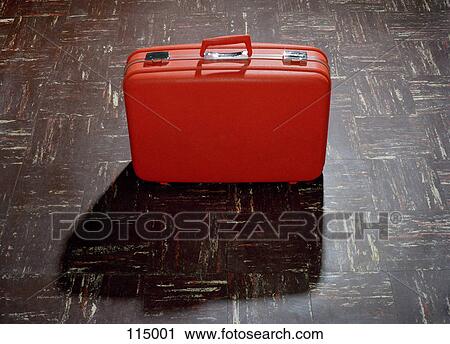 Stock Image - Suitcase on floor. Fotosearch