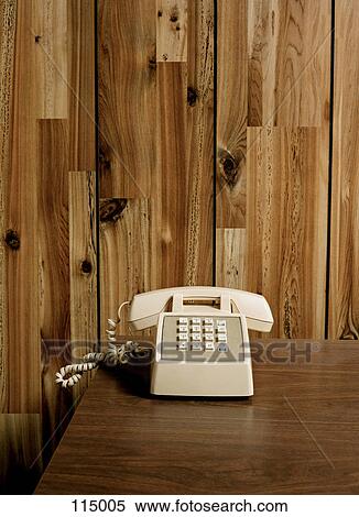 Telephone on wooden table View Large Photo Image Stock Photography - Telephone on wooden table. Fotosearch