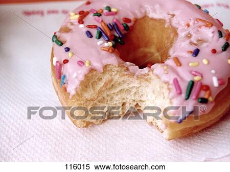 Stock Photography - Doughnut with missing bite. Fotosearch